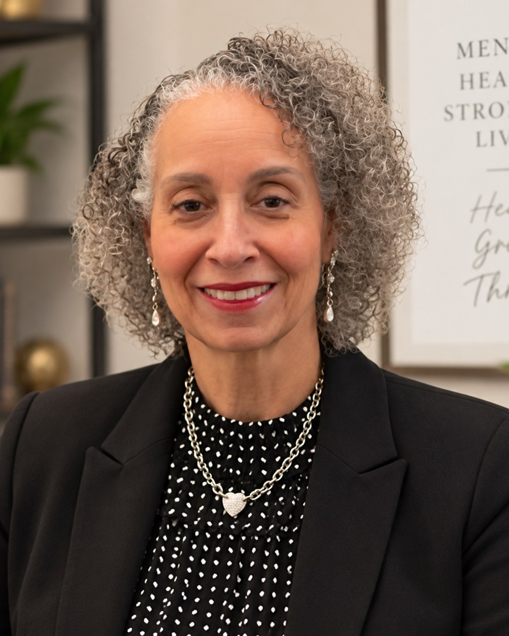Regina Willis, nurse practitioner, smiling in her office